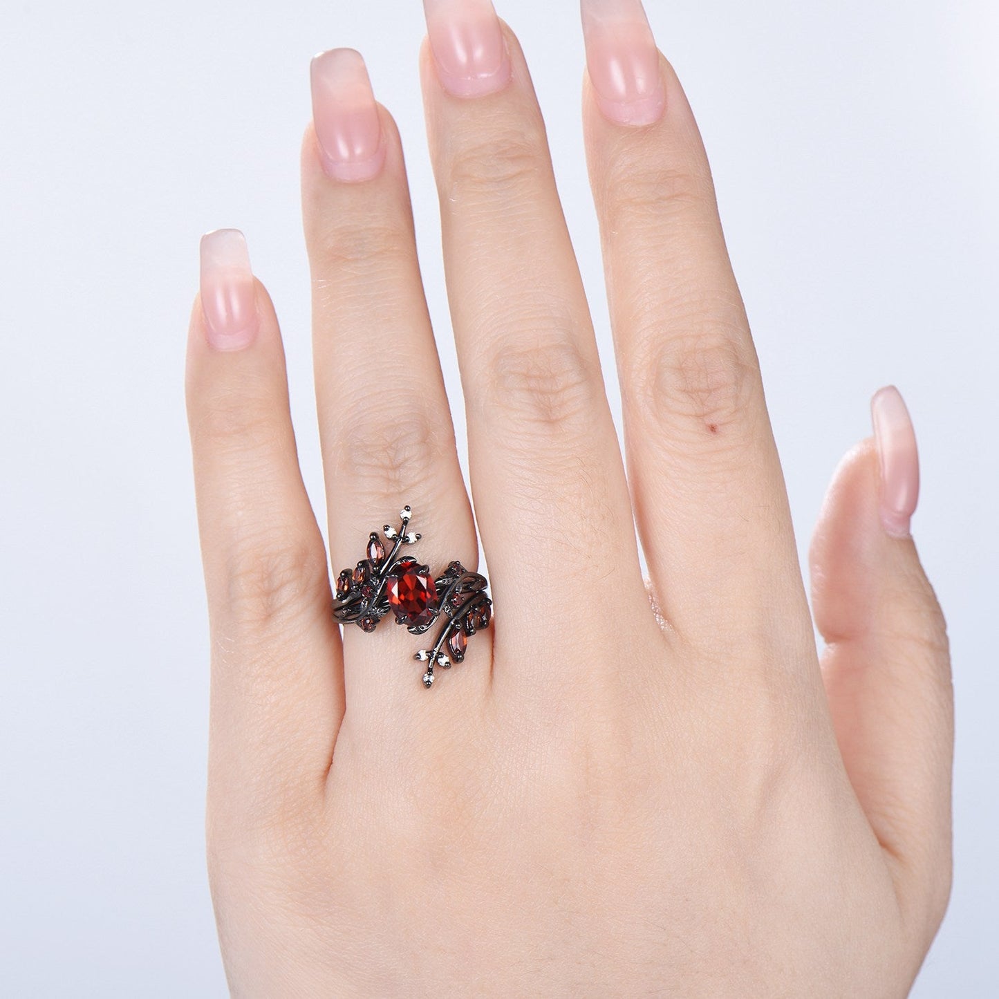 Nature inspired oval garnet engagement ring set black gold unique leaf gothic wedding ring set knight twig vine January birthstone jewelry