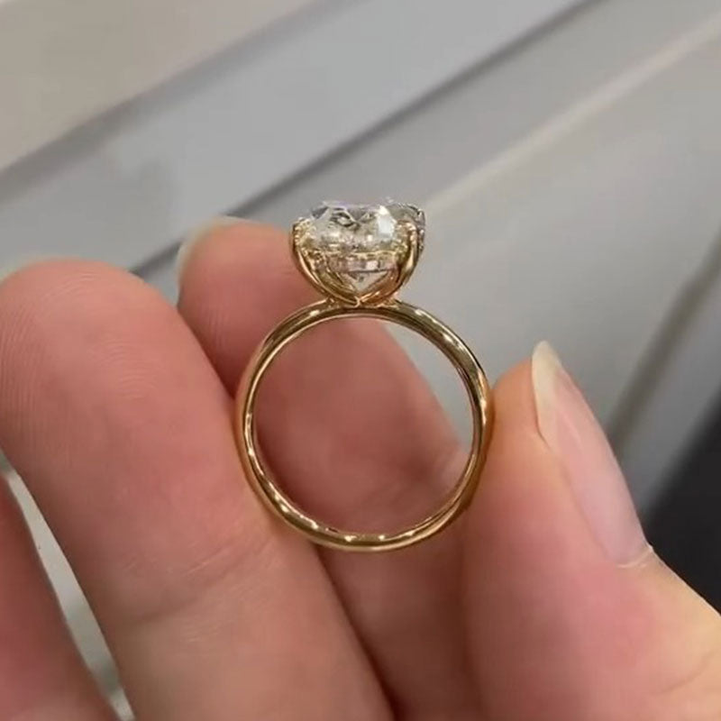 Simple Oval Cut Solitaire Engagement Ring