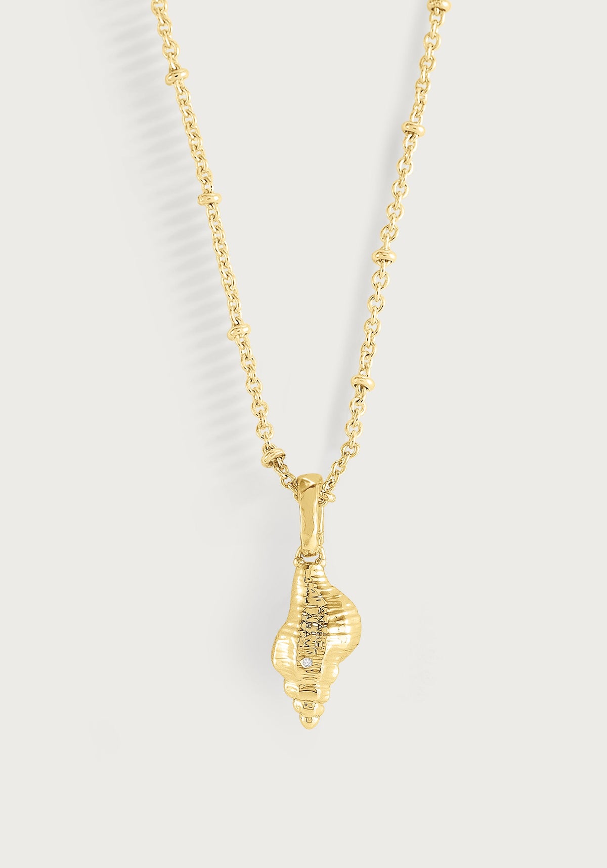 Milos Shell With Pearl Charm