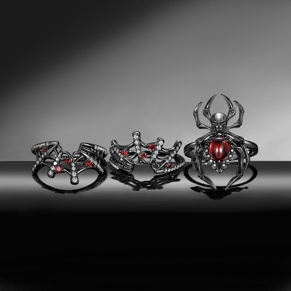 Spider Ring 'The Web' - Gothic Pear Cut Garnet Engagement Ring Set with Skull Inspired Band