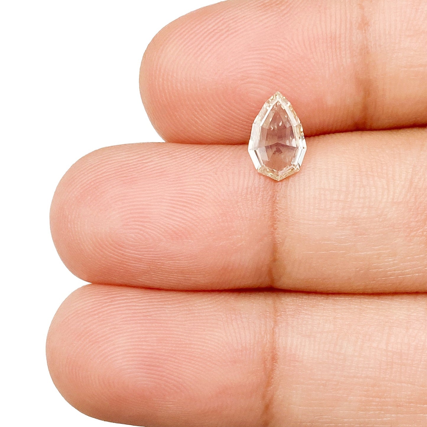 0.65ct | Champagne VVS Pear Shape Step Cut Diamond
