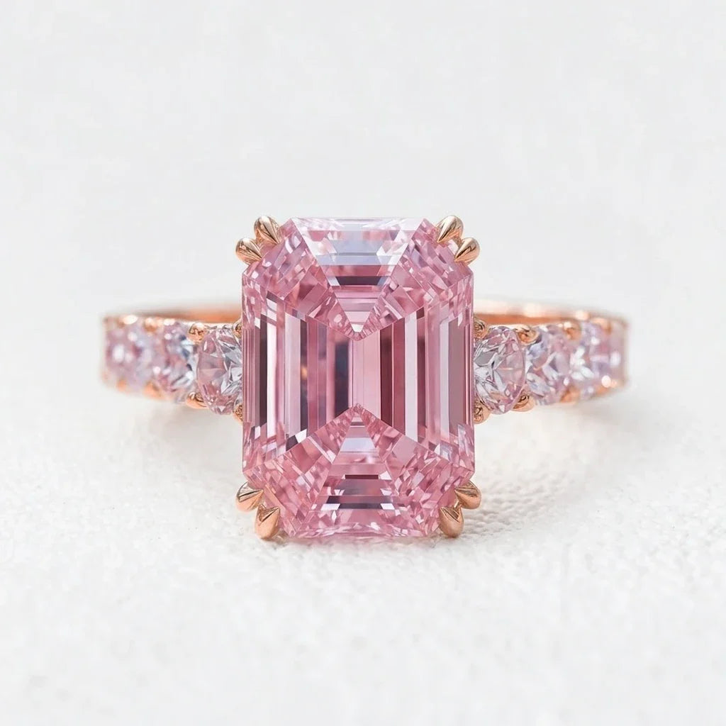 Aurora’s Aureole | 3CT Emerald Cut Pink Sapphire Engagement Ring