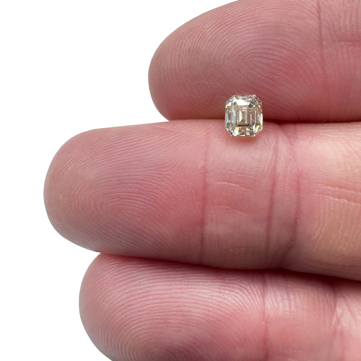0.71ct | Champagne SI Emerald Shape Step Cut Diamond