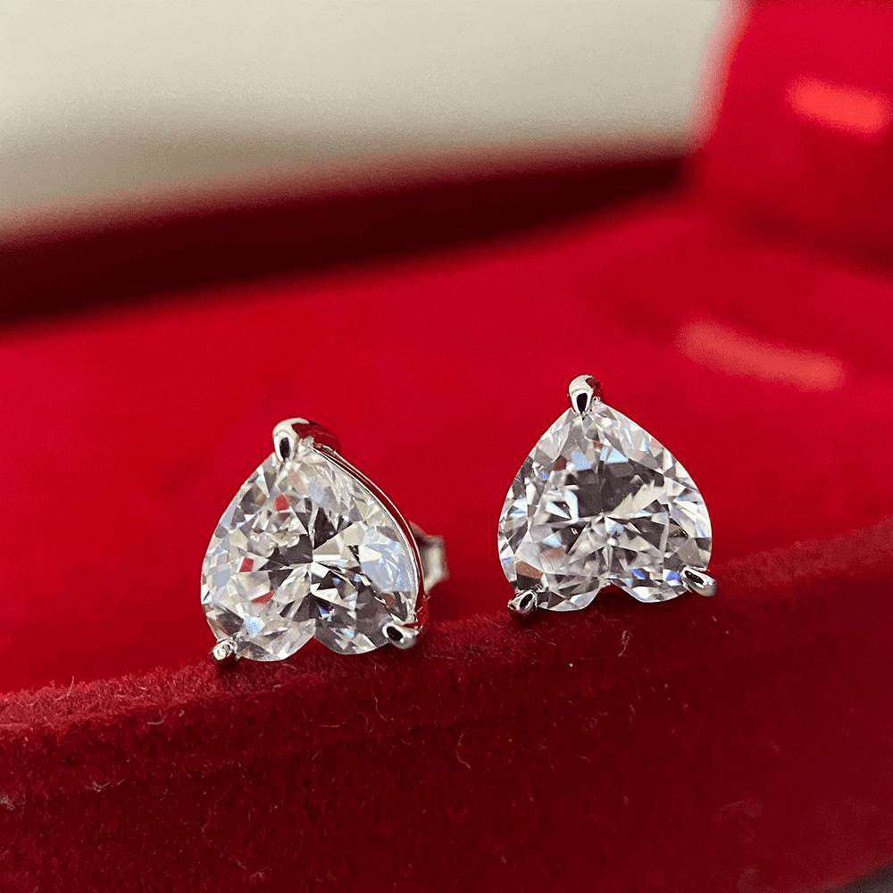 Elegant Heart Cut Women's Stud Earrings In Sterling Silver