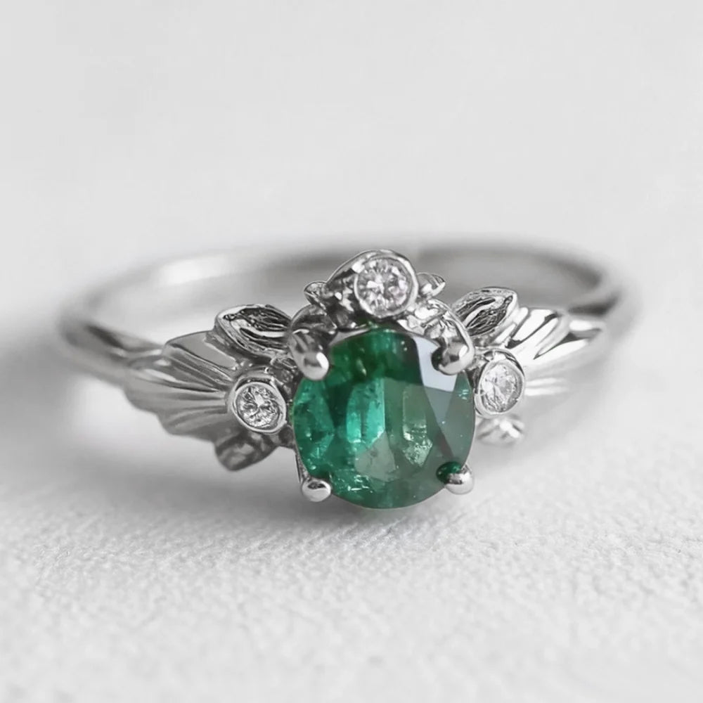 Eve’s Laurel | Natural Emerald Engagement Ring with Diamond Leaf Setting