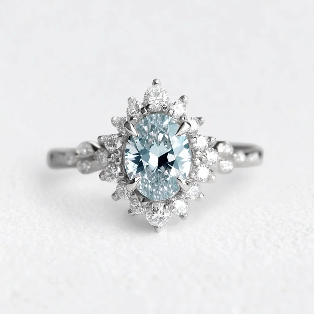 Theia’s Tide | Oval Aquamarine Halo Engagement Ring