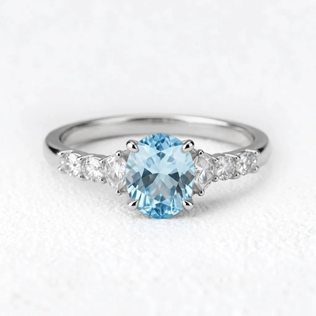 Celia’s Aqua | Oval Sea Blue Sapphire Engagement Ring