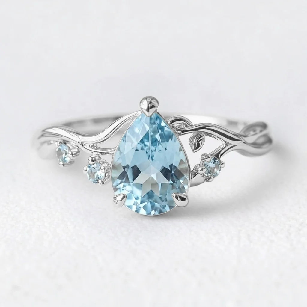 Athena’s Serenity | Pear Cut Blue Aquamarine Engagement Ring