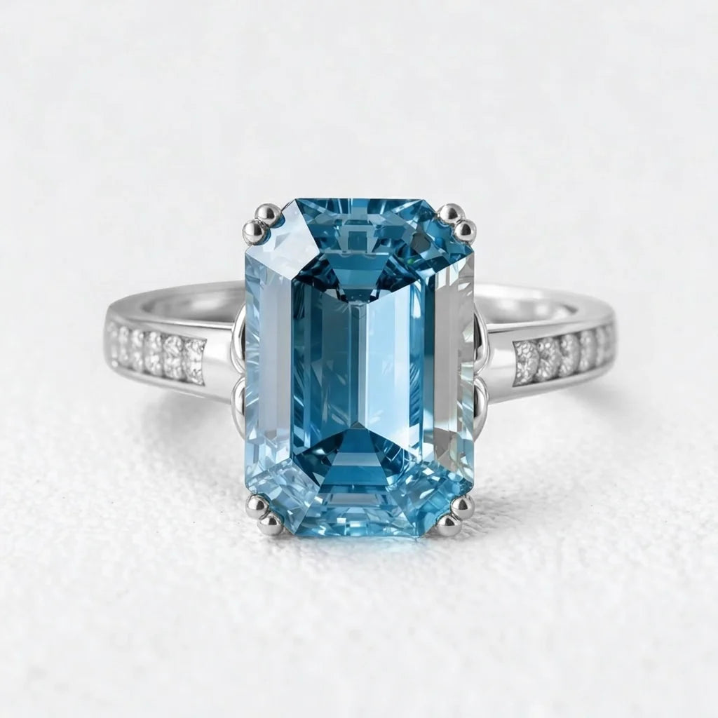 Marina’s Evermore | 5CT Emerald Cut Sapphire Solitaire Engagement Ring