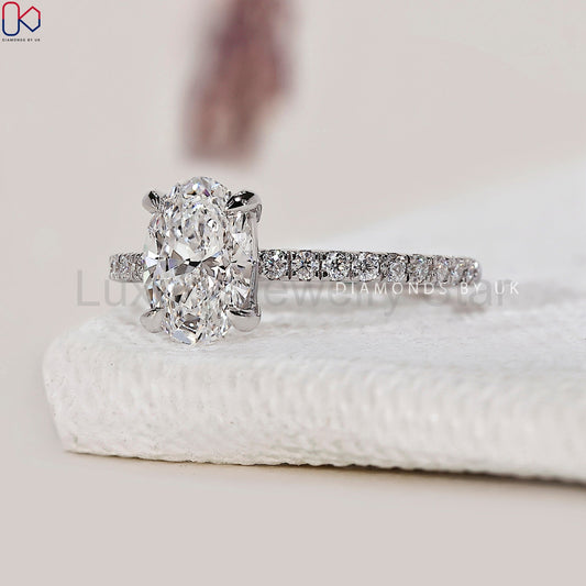 Oval Shaped Engagement Ring With Pave Setting - image 2