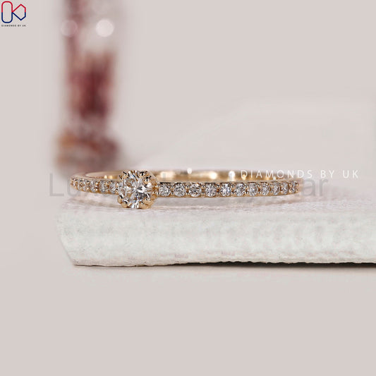 Round Cut Engagement Ring In Yellow Gold - image 2