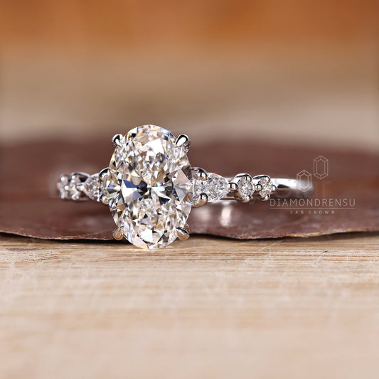 Oval Cut Diamond Ring with Pear and Round Side Stones - image 2
