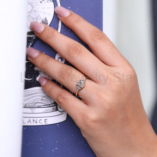 Oval Shaped Engagement Ring with Marquise and Round Side Stones - image 2