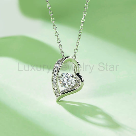 Dancing Moissanite Heart-Shaped Side Stone Necklace in Sterling Silver - image 2