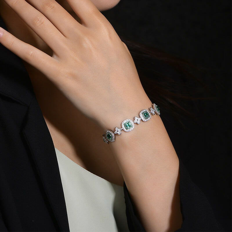 Alternating Halo Emerald And Four Leaf Bracelet In Sterling Silver