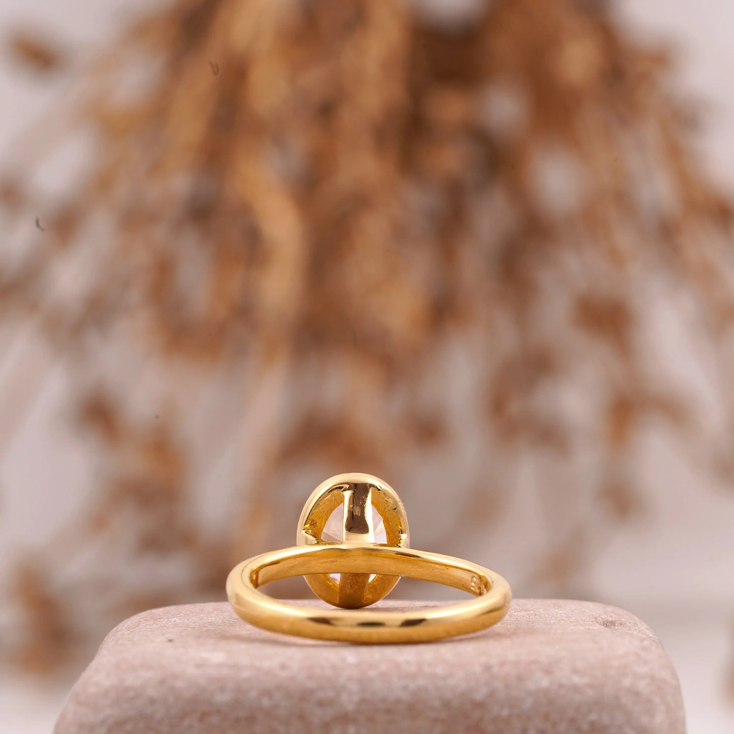 Oval Cut Bezel Set Engagement Ring