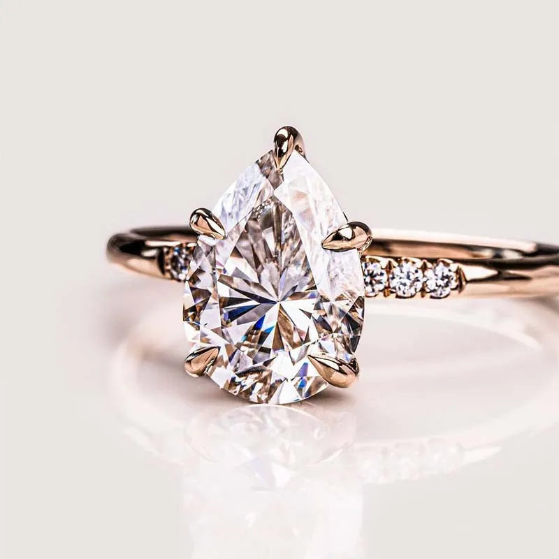 Ornate Pear Cut 3.5ct Side Stone Engagement Ring In Sterling Silver