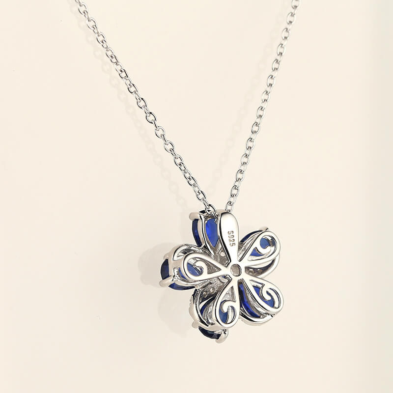 Five Petal Sapphire Flower Necklace In Sterling Silver
