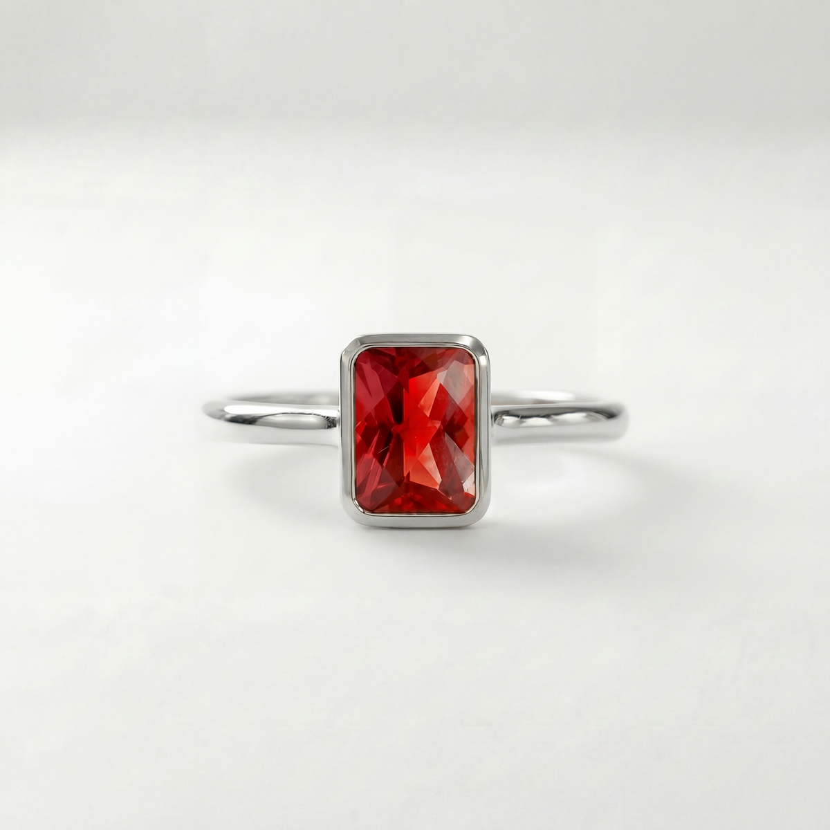 The Classic Bezel Ring | Lab-Grown Orange Sapphire