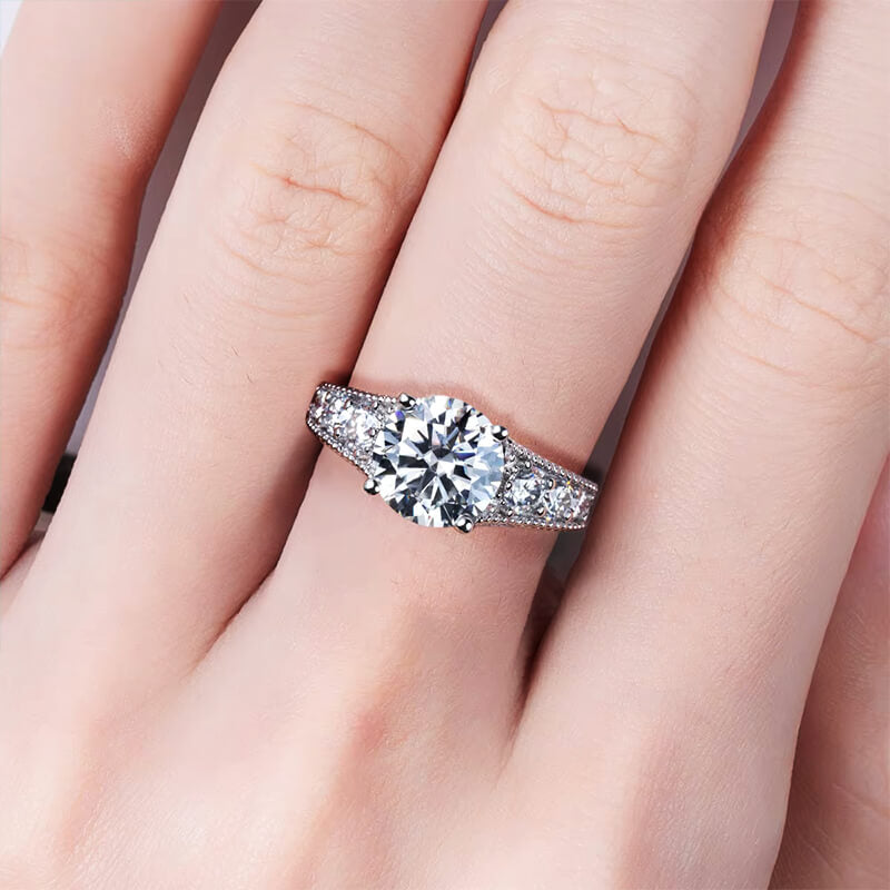 Round Moissanite Graduated Side Stone Milgrain Engagement Ring