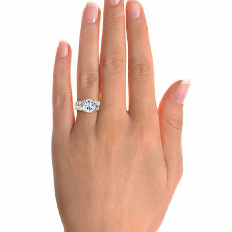 Round Moissanite Offset Side Stone Row Engagement Ring
