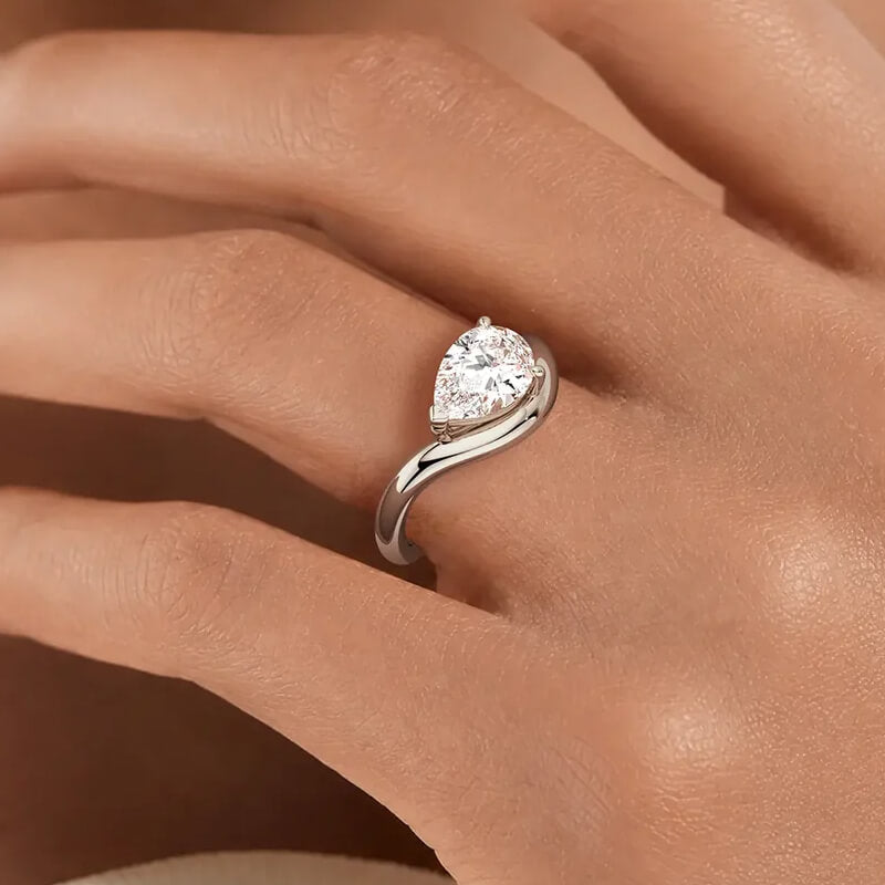 Silhouette Solitaire Pear Cut Moissanite Engagement Ring