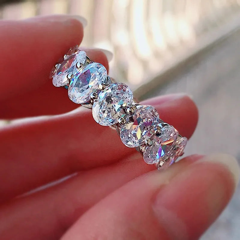 Charming 925 Sterling Silver Oval Cut & Emerald Cut Wedding Ring Set