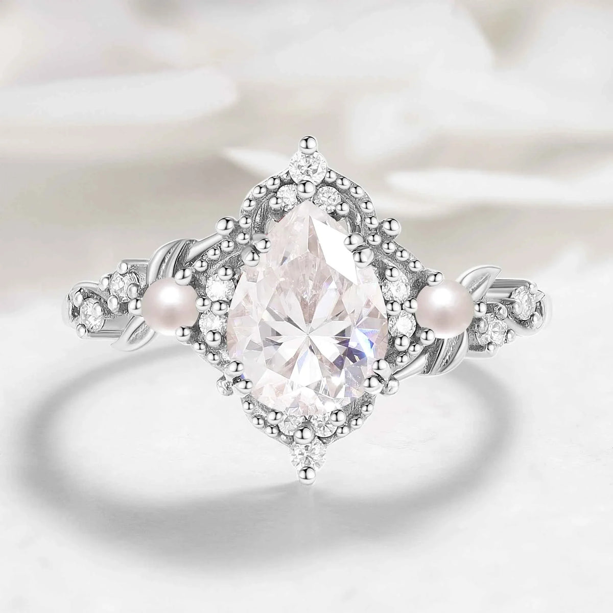 Nature Inspired Leaf Pear Cut Moissanite Engagement Ring With Pearl