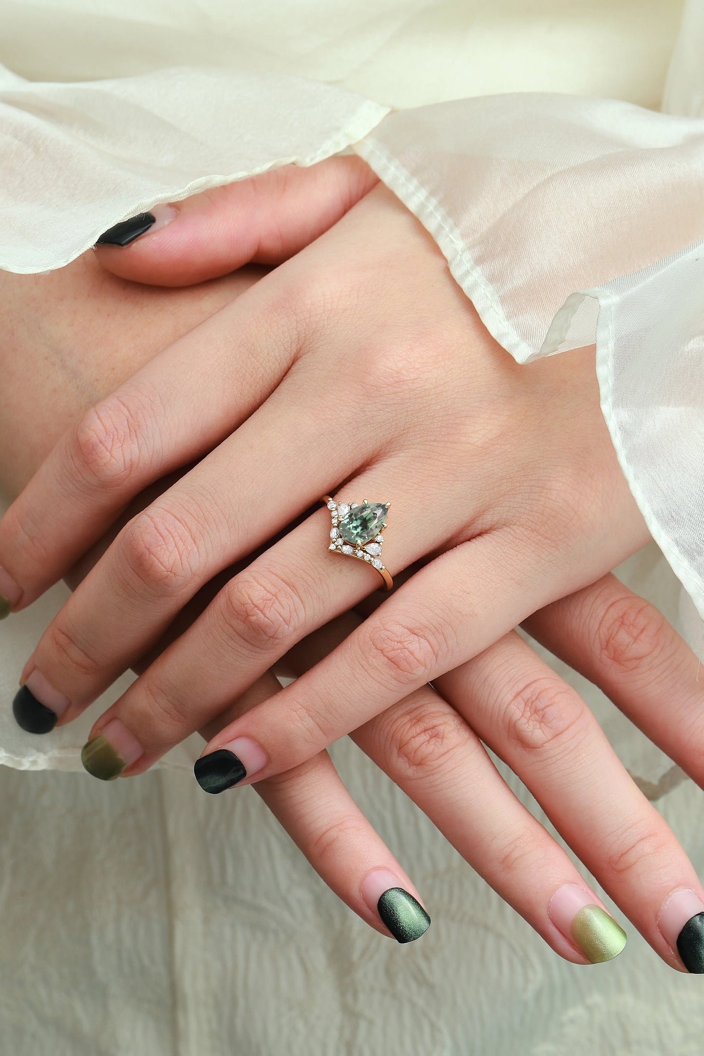 Pavé Half-Halo Pear Cut Green Sapphire Engagement Ring
