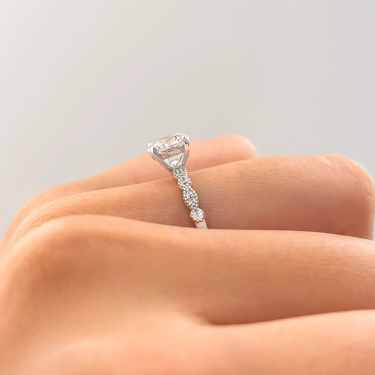 Lustrous Round Cut 1.2ct Pave Engagement Ring In Sterling Silver