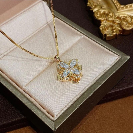 Rotating four-leaf clover necklace