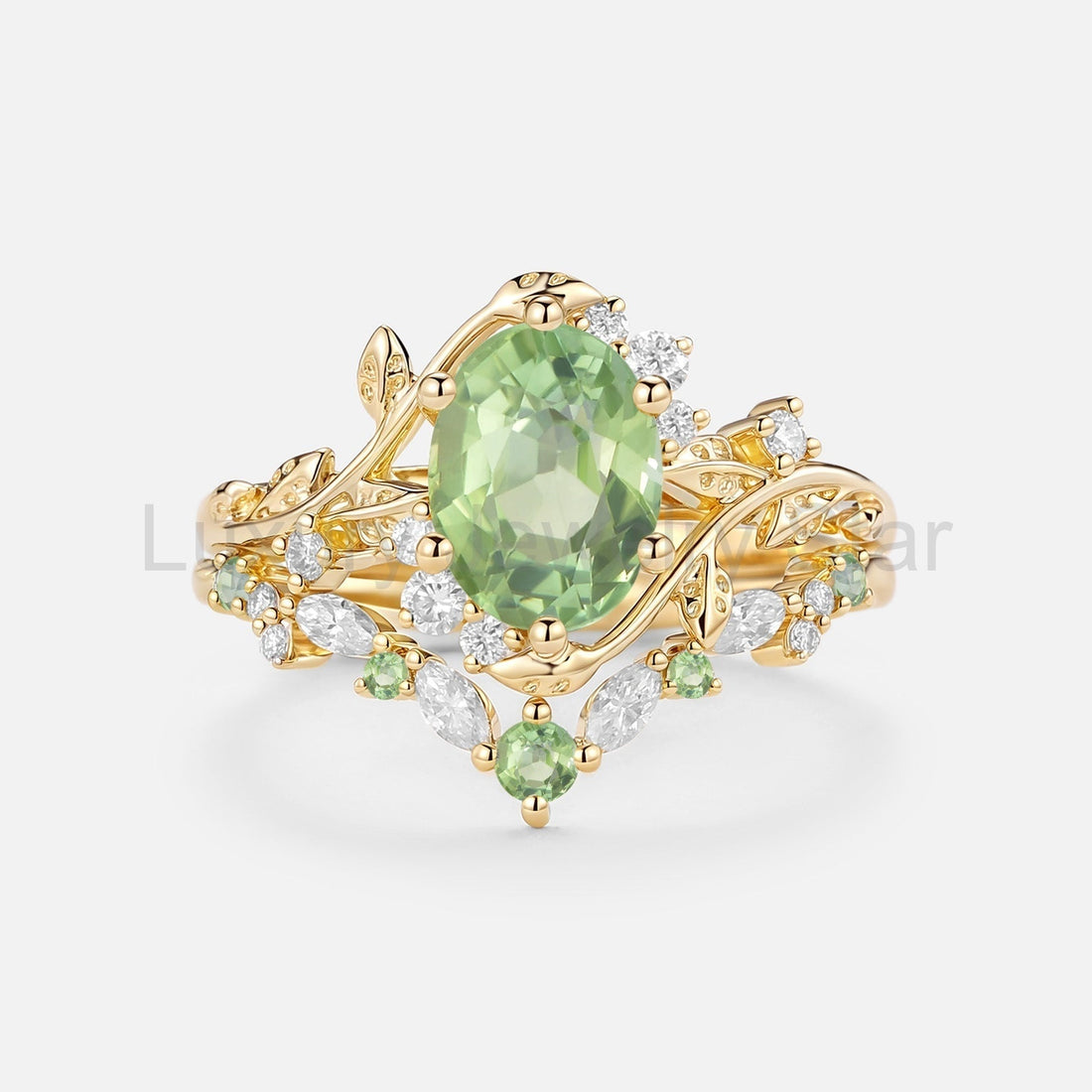 Oval cut green tourmaline leaf engagement ring set from Luxury Jewelry Star
