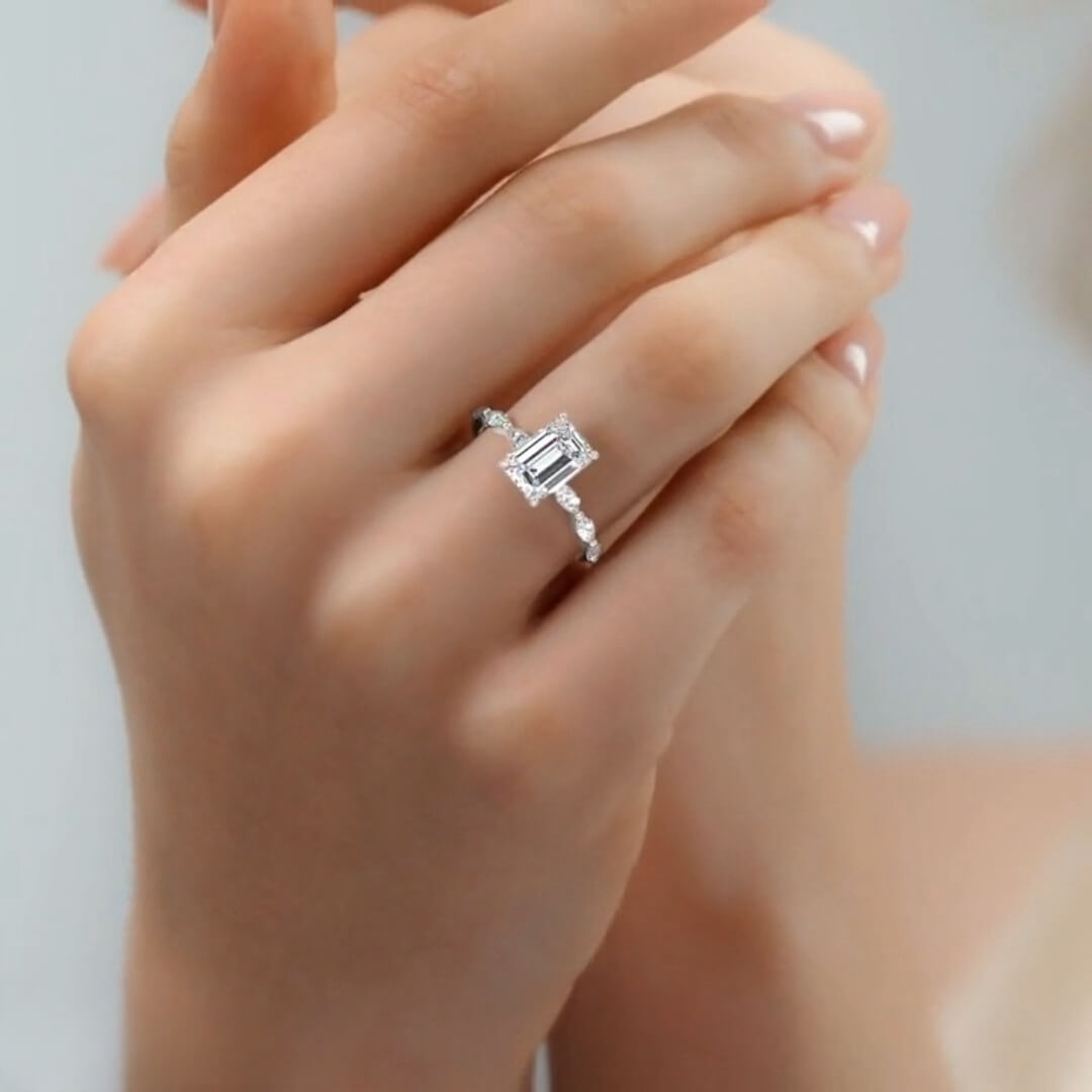 Sublime Solarii Moissanite 2.0ct Emerald Cut 925 Sterling Side Stone Engagement Ring