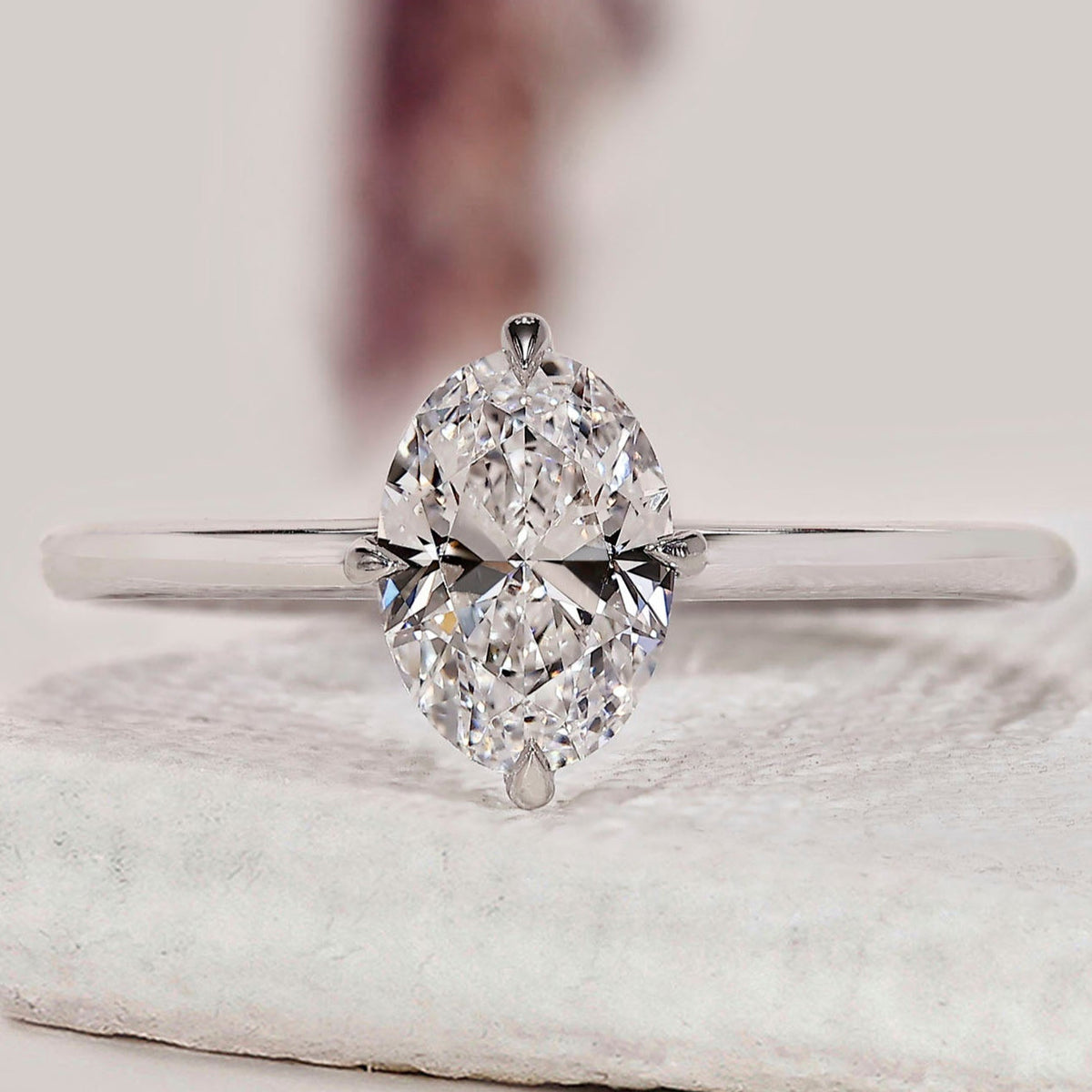Oval Solitaire Engagement Ring In White Gold