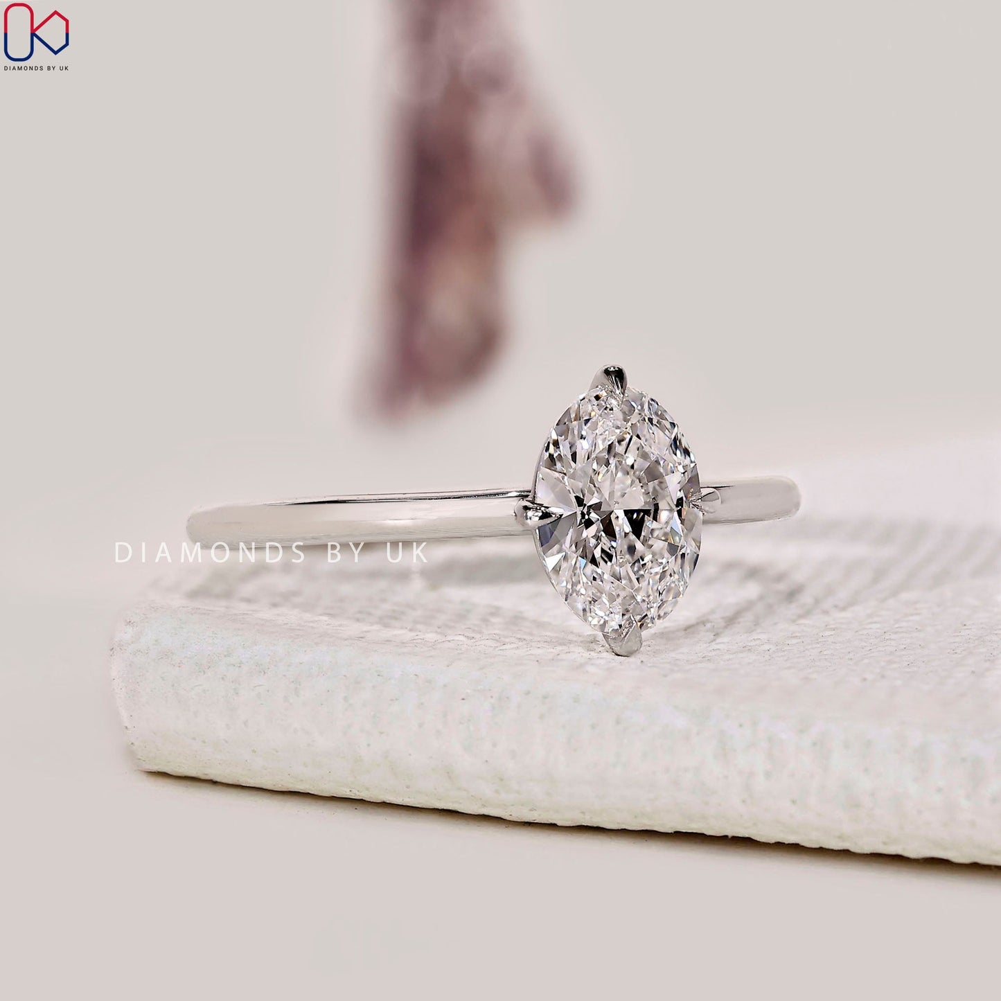 Oval Solitaire Engagement Ring In White Gold