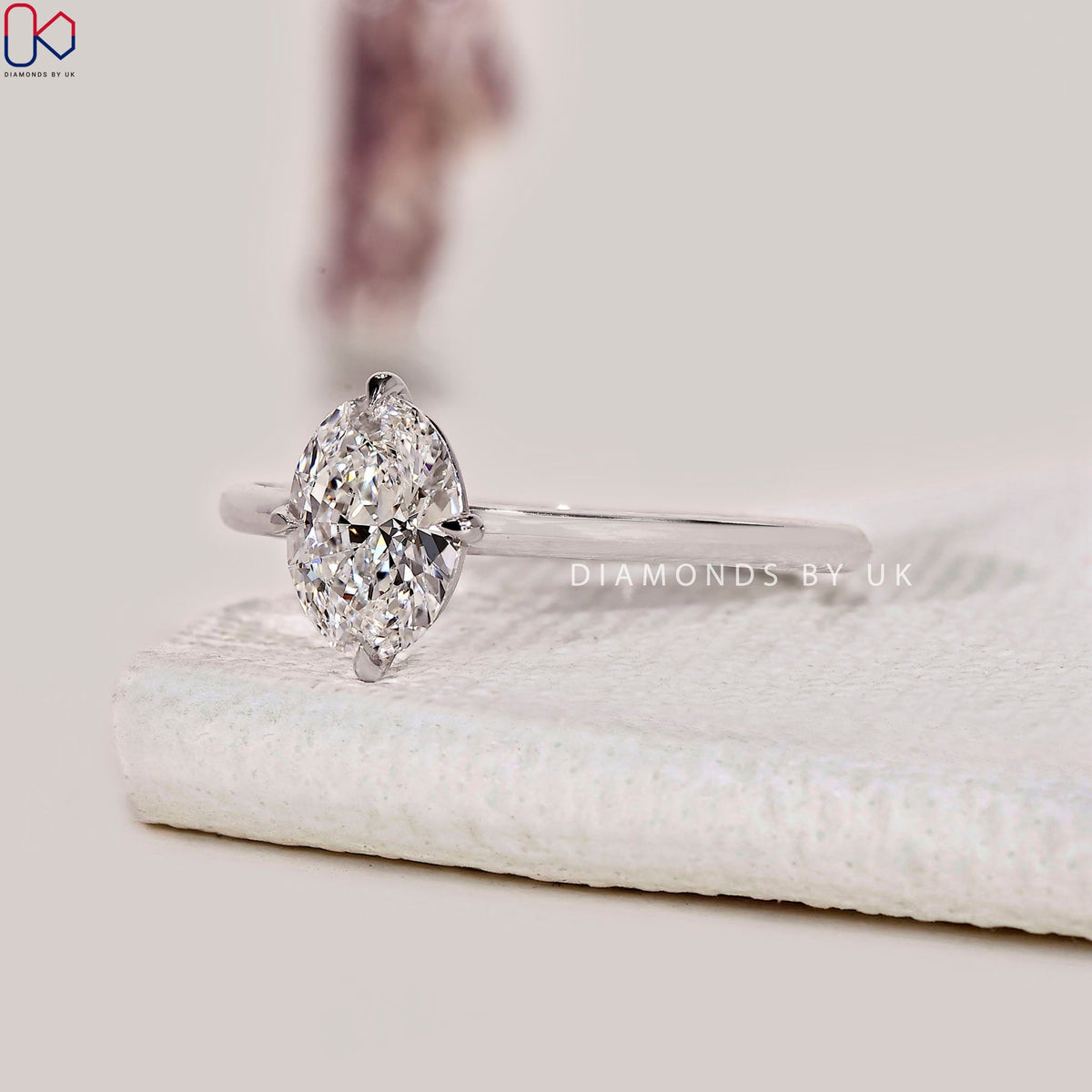 Oval Solitaire Engagement Ring In White Gold