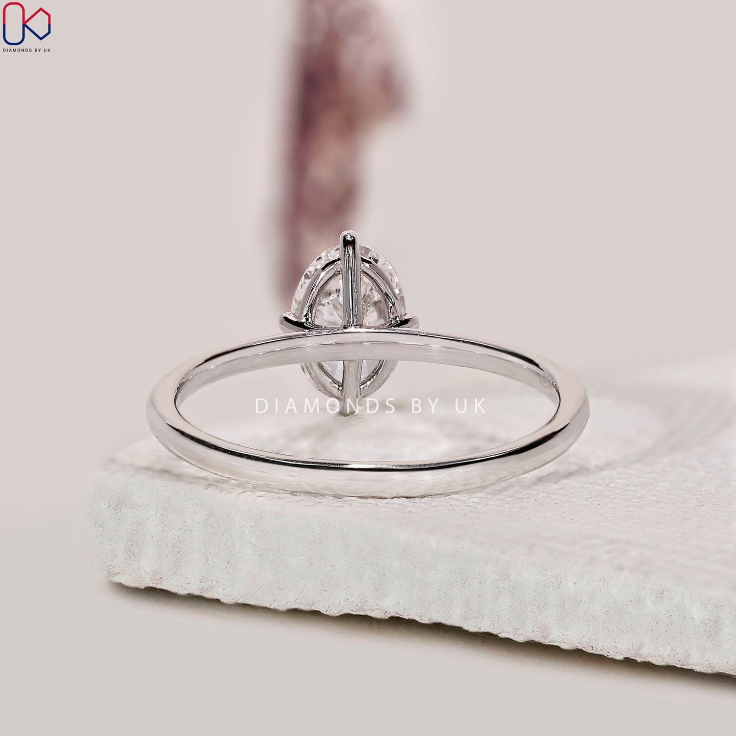 Oval Solitaire Engagement Ring In White Gold