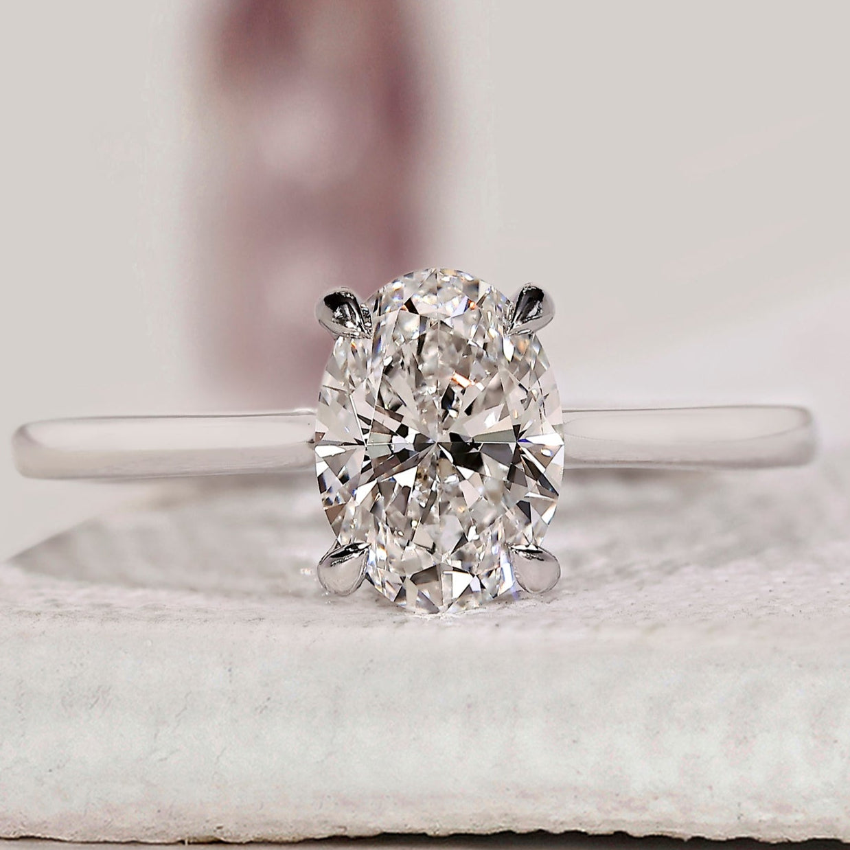 Oval Solitaire Engagement Ring With Cathedral Setting