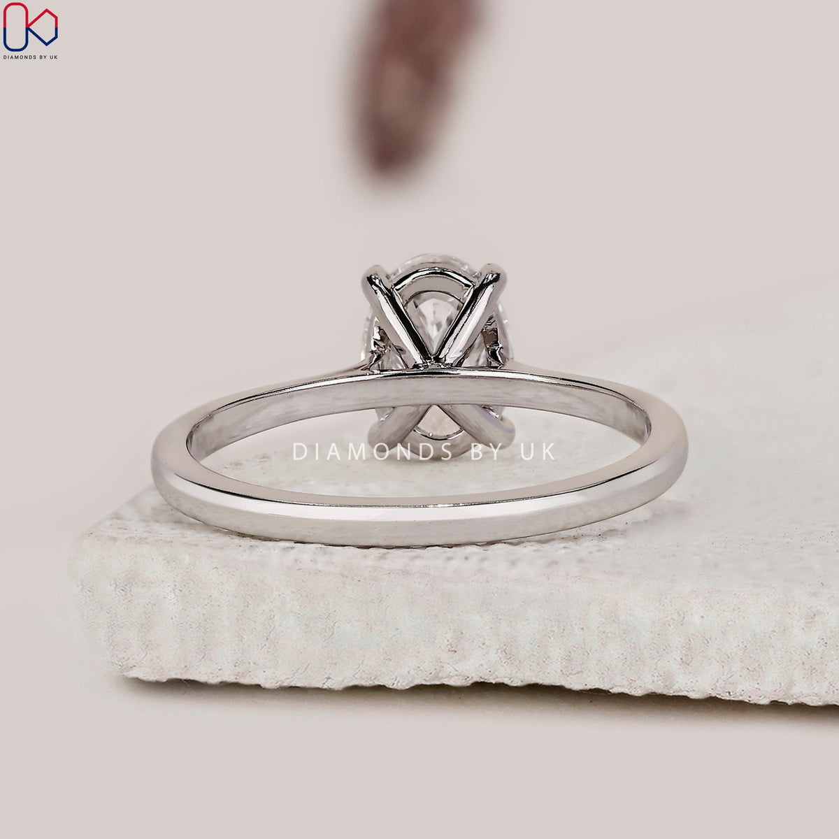 Oval Solitaire Engagement Ring With Cathedral Setting