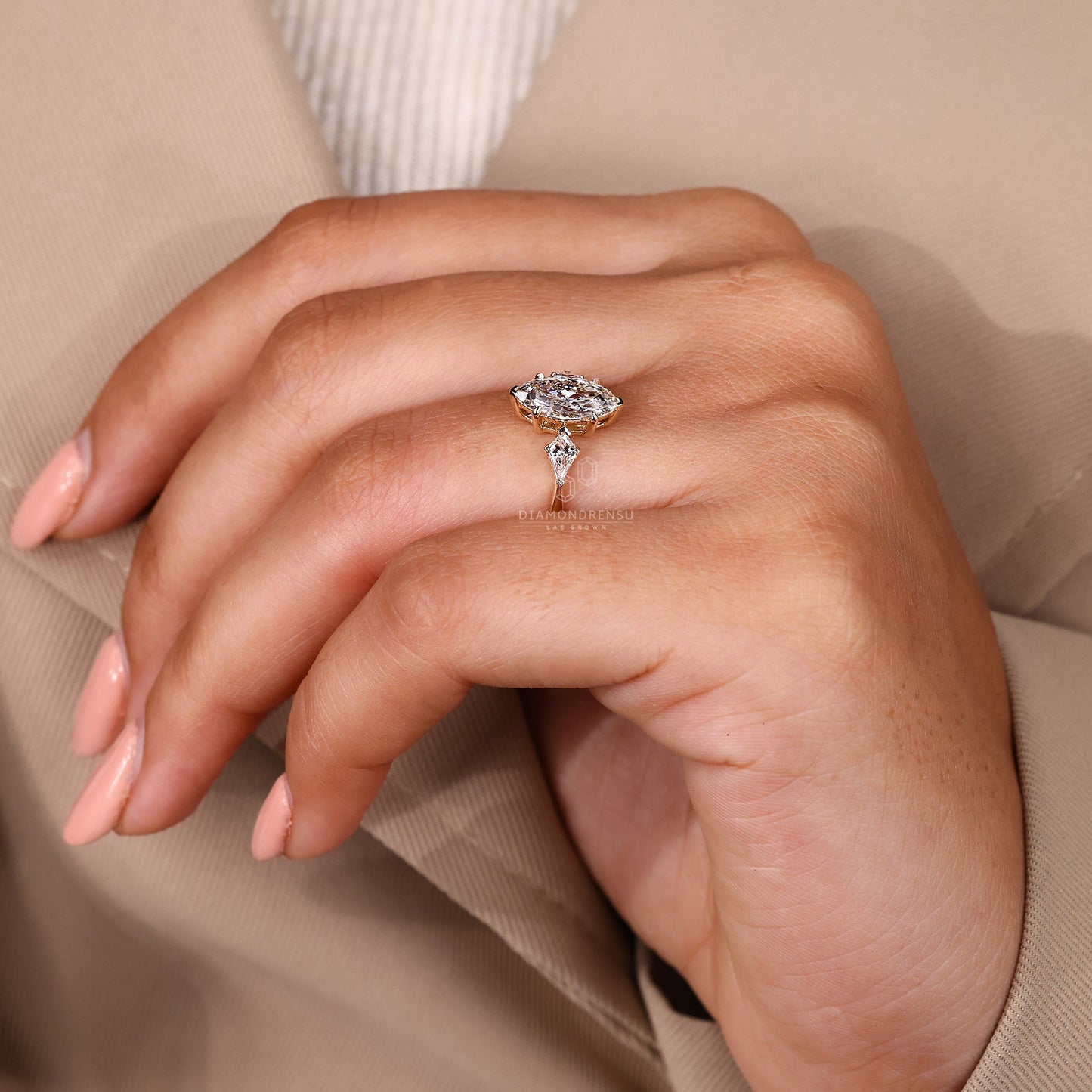 Marquise and Kite Cut Three Stone Engagement Ring