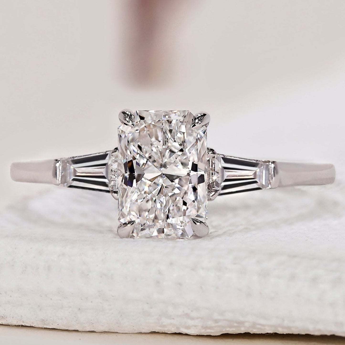 Radiant Cut Diamond Ring With Tapered Baguette Side Stone