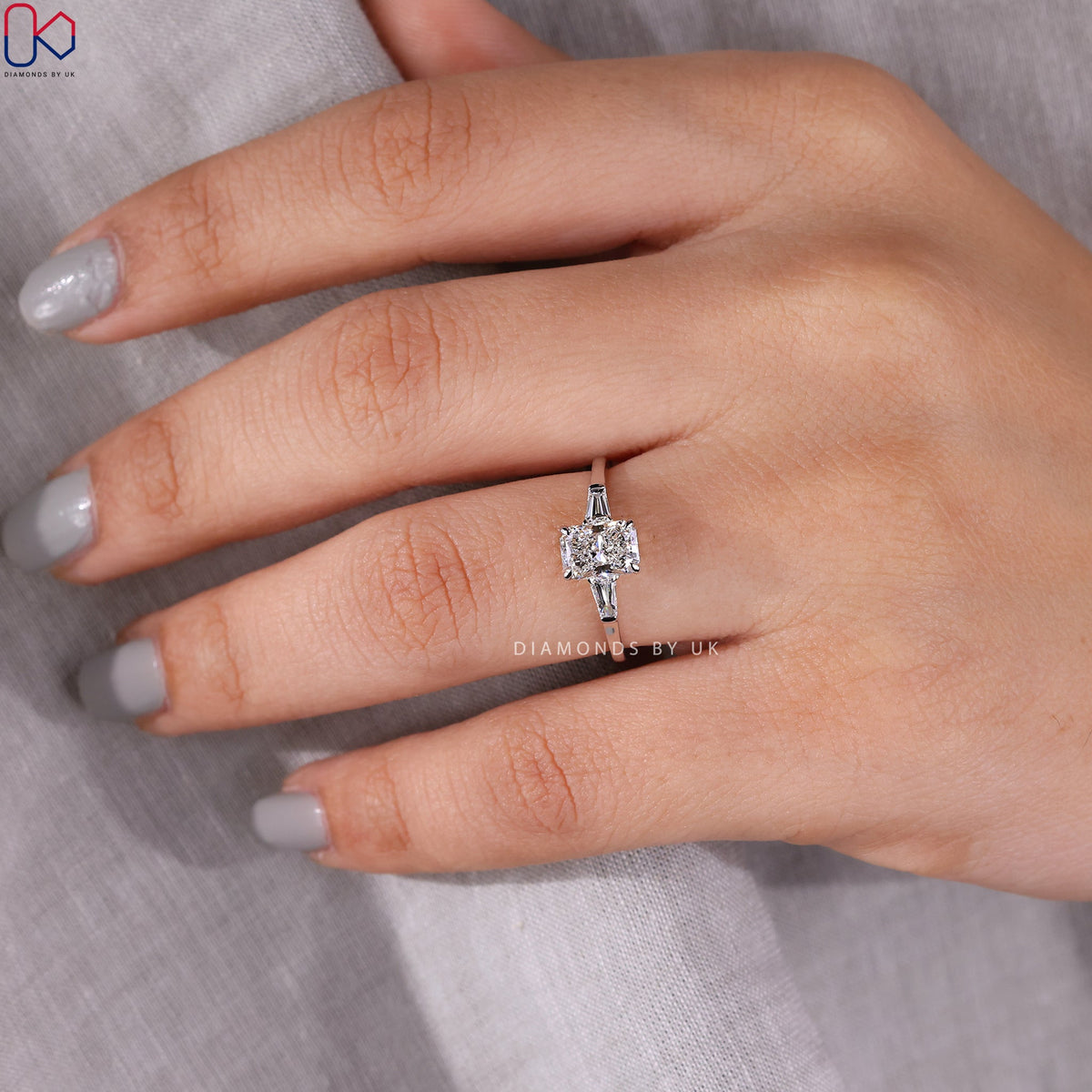 Radiant Cut Diamond Ring With Tapered Baguette Side Stone