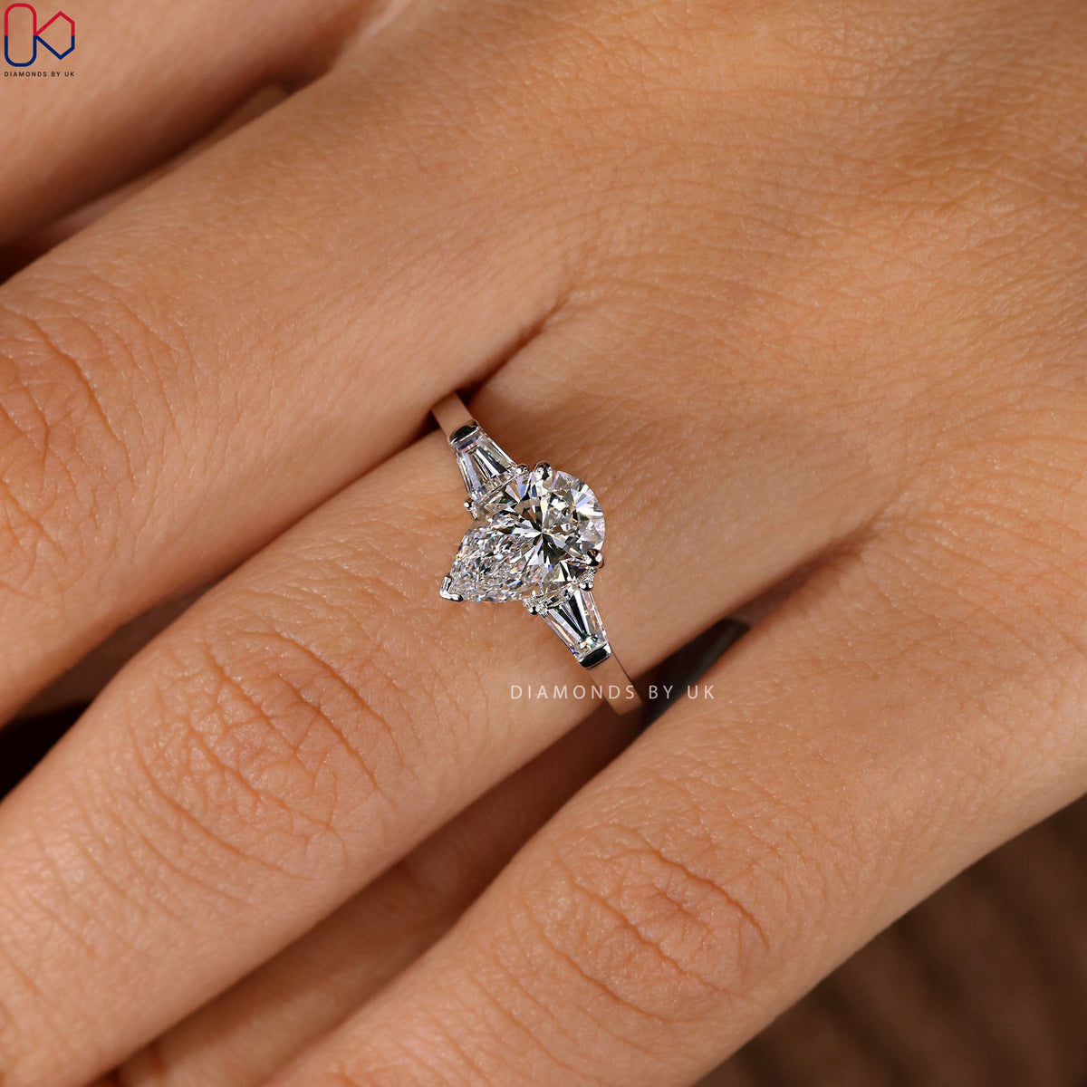 Teardrop Diamond Ring With 2 Tapered Baguette Side Stone