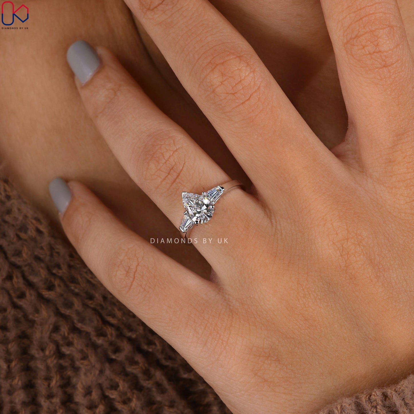 Teardrop Diamond Ring With 2 Tapered Baguette Side Stone