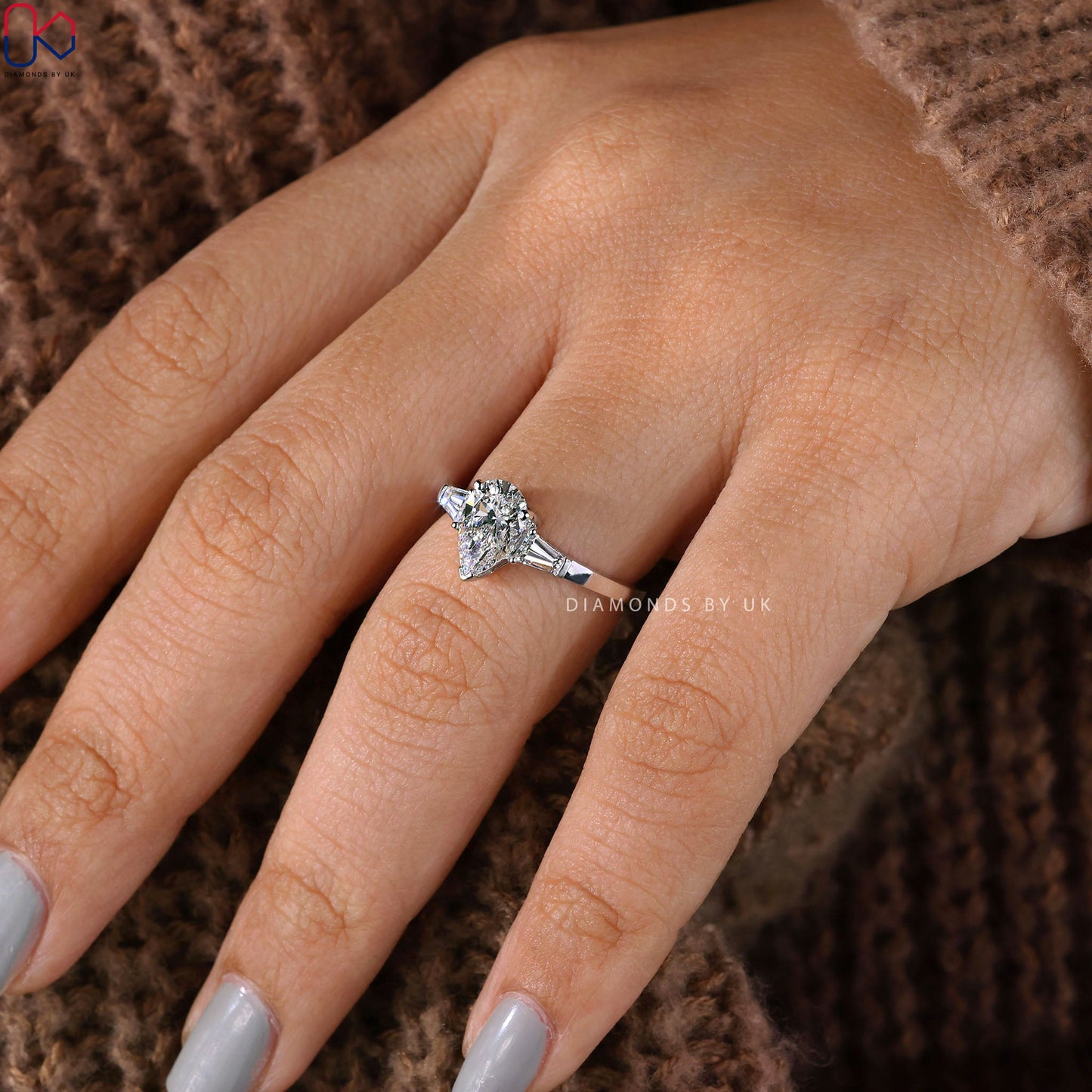 Teardrop Diamond Ring With 2 Tapered Baguette Side Stone