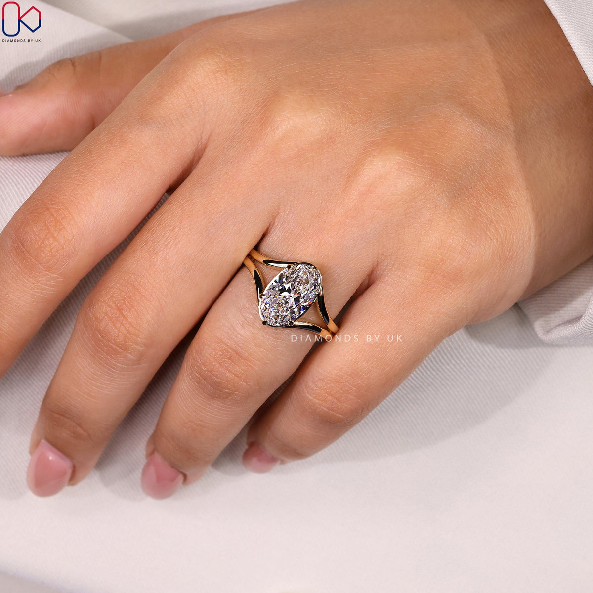 Oval Diamond Split Shank Engagement Ring