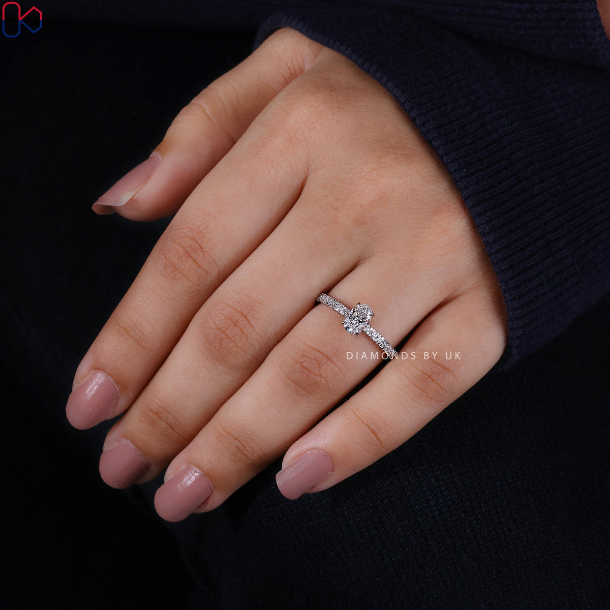 Gold Oval Diamond Engagement Ring In Pave Setting