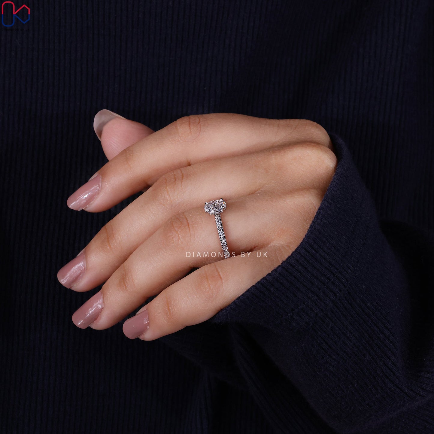 Gold Oval Diamond Engagement Ring In Pave Setting