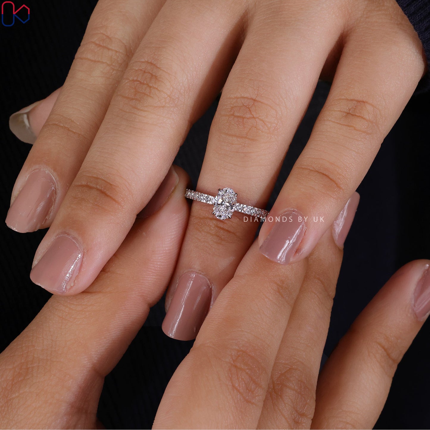 Gold Oval Diamond Engagement Ring In Pave Setting