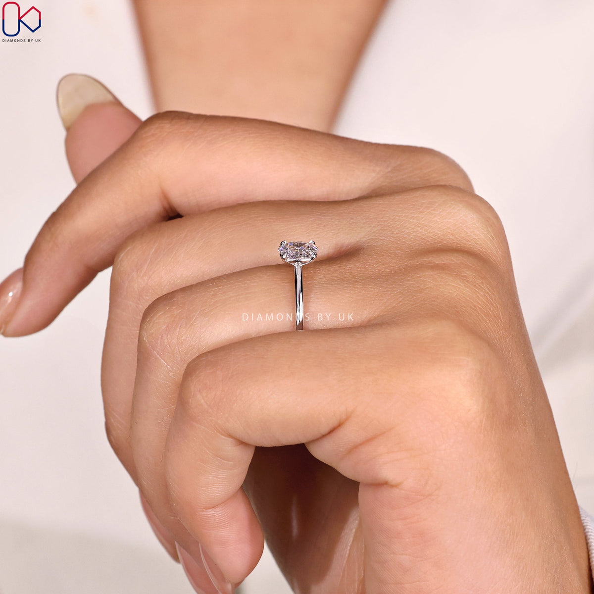 Oval Solitaire Engagement Ring In Prong Setting